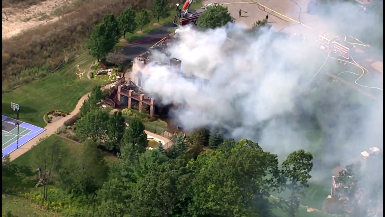 Authorities investigating after flames tear through Washington...